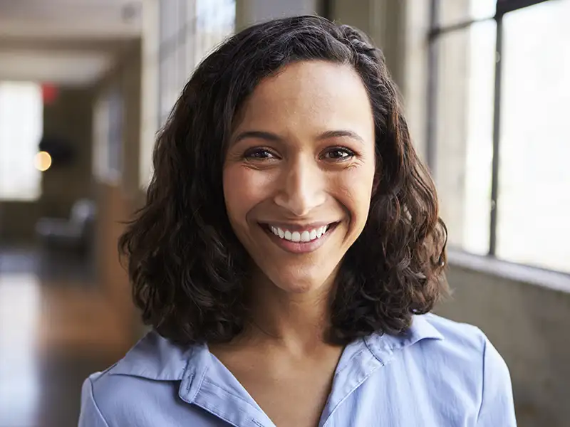 adult woman smiling in office