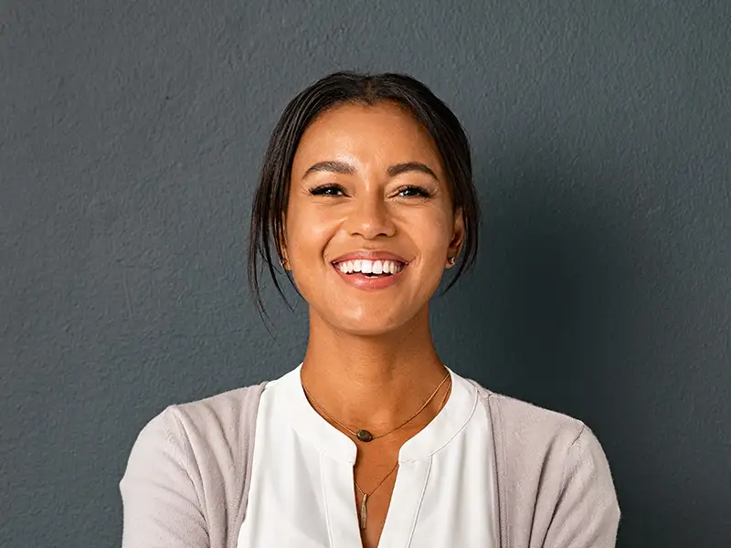 adult woman smiling indoors